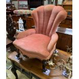 A Victorian mahogany spoon back nursing chair, width 63cm, depth 55cm, height 86cm