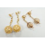 A modern pair of pierced 9ct gold globe drop earrings, 47mm and one other pair of 9ct drop earrings,