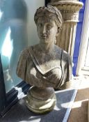 A reconstituted stone female bust on shallow plinth, height 83cm