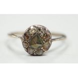 An antique yellow and white metal set rose cut diamond cluster ring, size S/T, gross weight 2.2