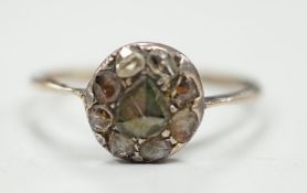 An antique yellow and white metal set rose cut diamond cluster ring, size S/T, gross weight 2.2