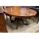 A Victorian oval figured walnut tilt top loo table, length 152cm, width 118cm, height 69cm