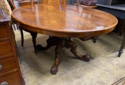 A Victorian oval figured walnut tilt top loo table, length 152cm, width 118cm, height 69cm