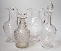 Two Victorian cut glass decanters, a ewer and a jug. Tallest 32cm