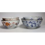 Four 18th century Chinese bowls, one painted in underglaze blue with the eight immortals, with six