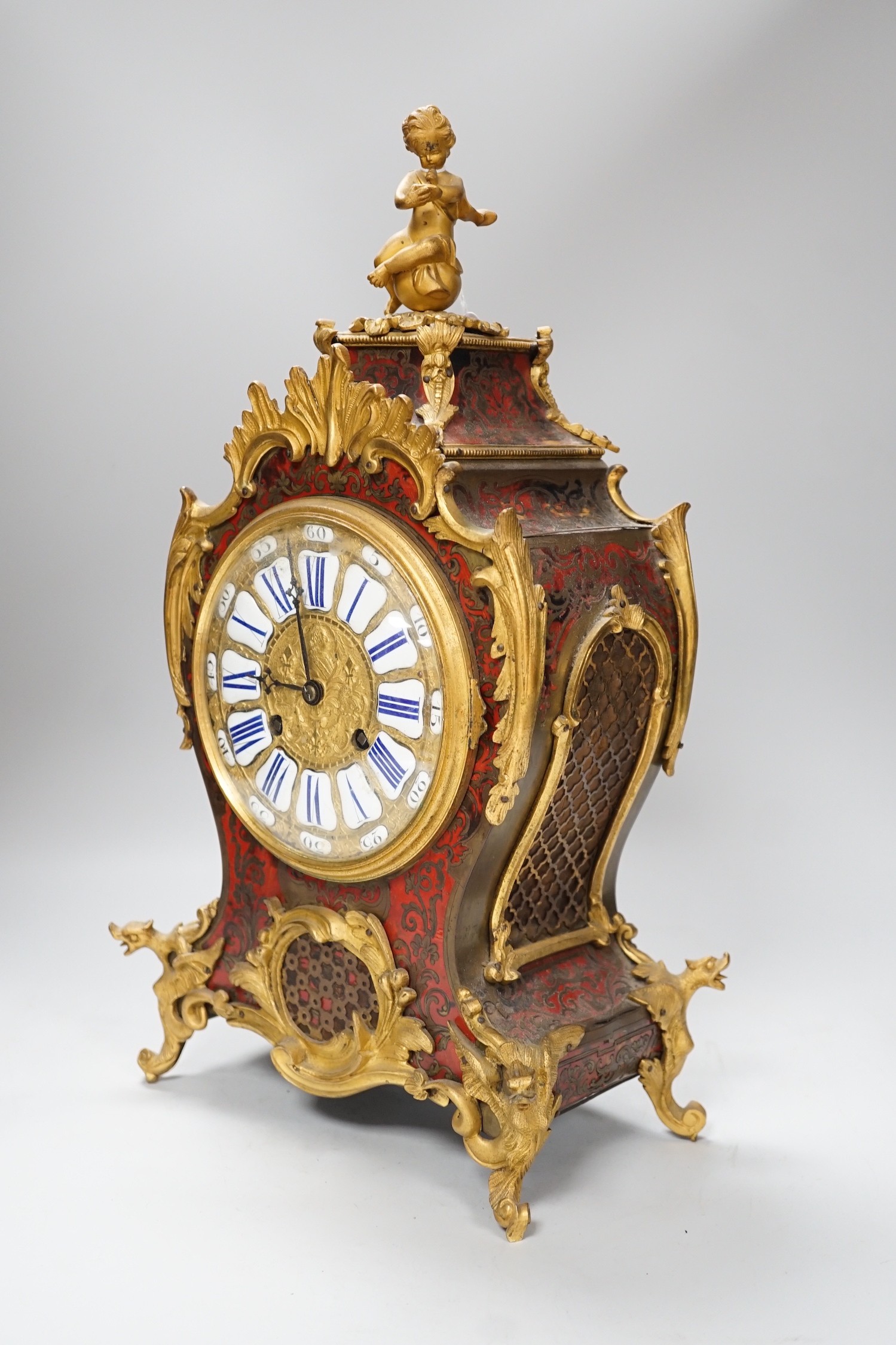 A French scarlet Boulle work and ormolu mounted mantel clock with enamel dial, 45cms high - Image 3 of 6