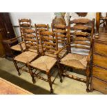 A set of eight reproduction elm and beech rush seat ladder back dining chairs, two with arms
