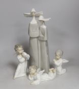 A selection of four assorted Lladro ceramic figures. Tallest 32.5cm