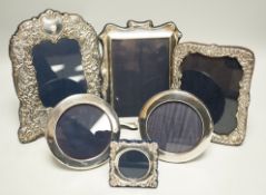 Six assorted modern silver mounted photograph frames, largest 21cm.