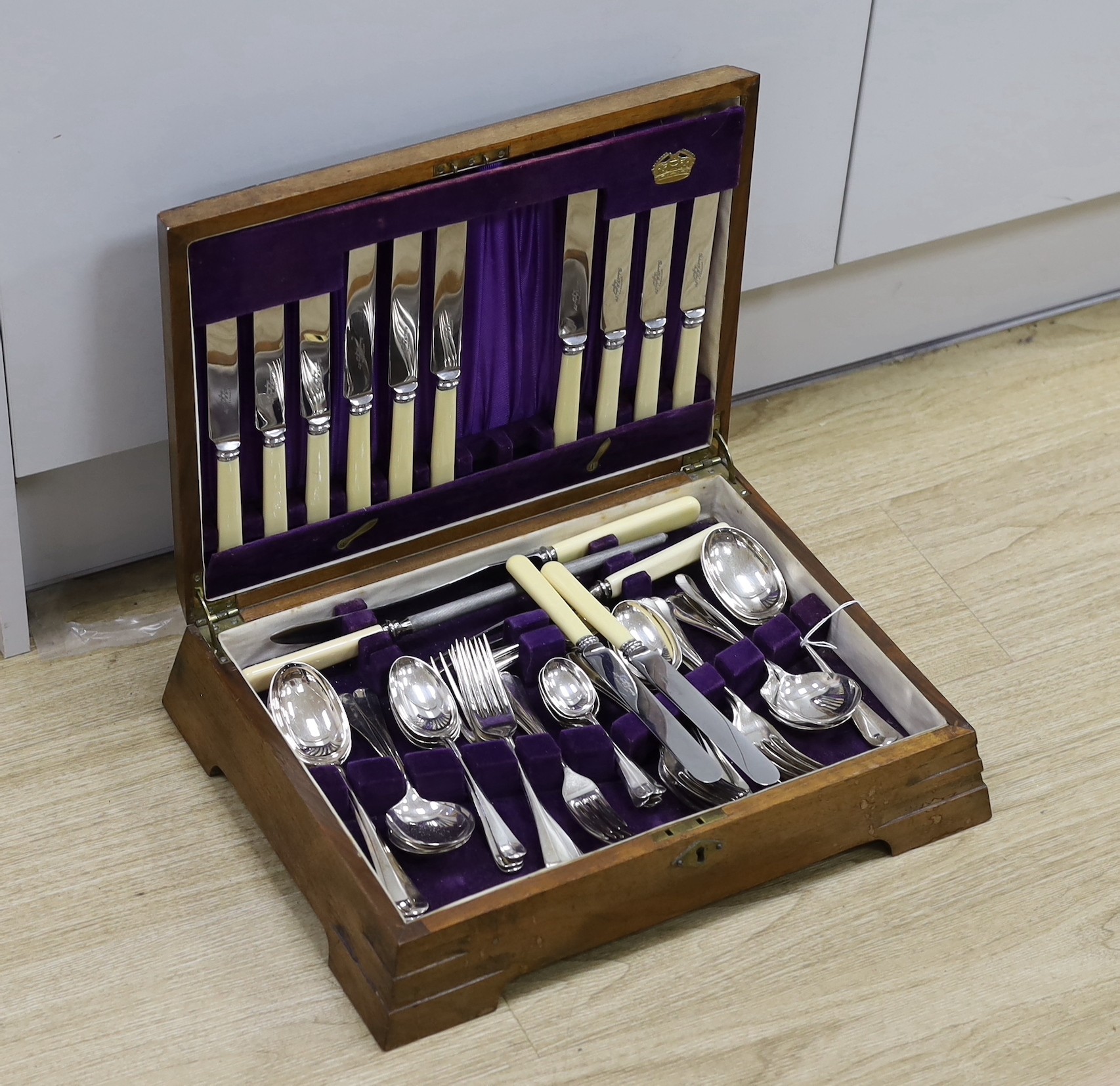 A cased plated canteen of cutlery