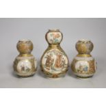 A pair of Japanese Satsuma pottery double gourd shaped vases another similar single vase,. Tallest