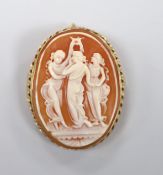 A modern 9ct gold mounted oval cameo shell pendant brooch, carved with The Three Graces, 41mm, gross