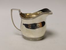 A George III silver helmet shaped cream jug, London, 1810, 10cm, 5.8oz.