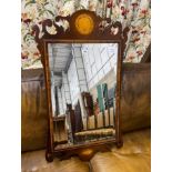 A George III style shell inlaid mahogany fret cut wall mirror, width 52cm, height 91cm