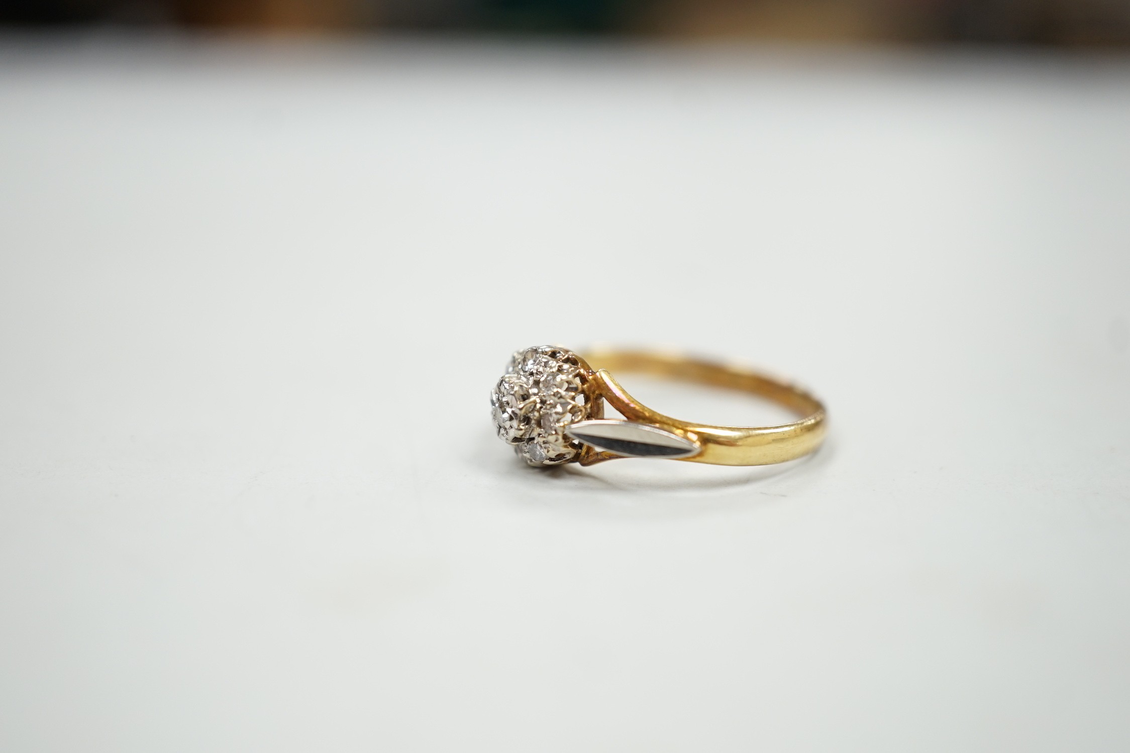 An 18ct and diamond cluster set ring, size K, gross weight 2.4 grams. - Image 2 of 4