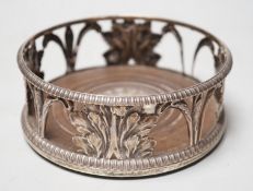 An early 19th century silver mounted wine coaster, marks rubbed, 14cn.