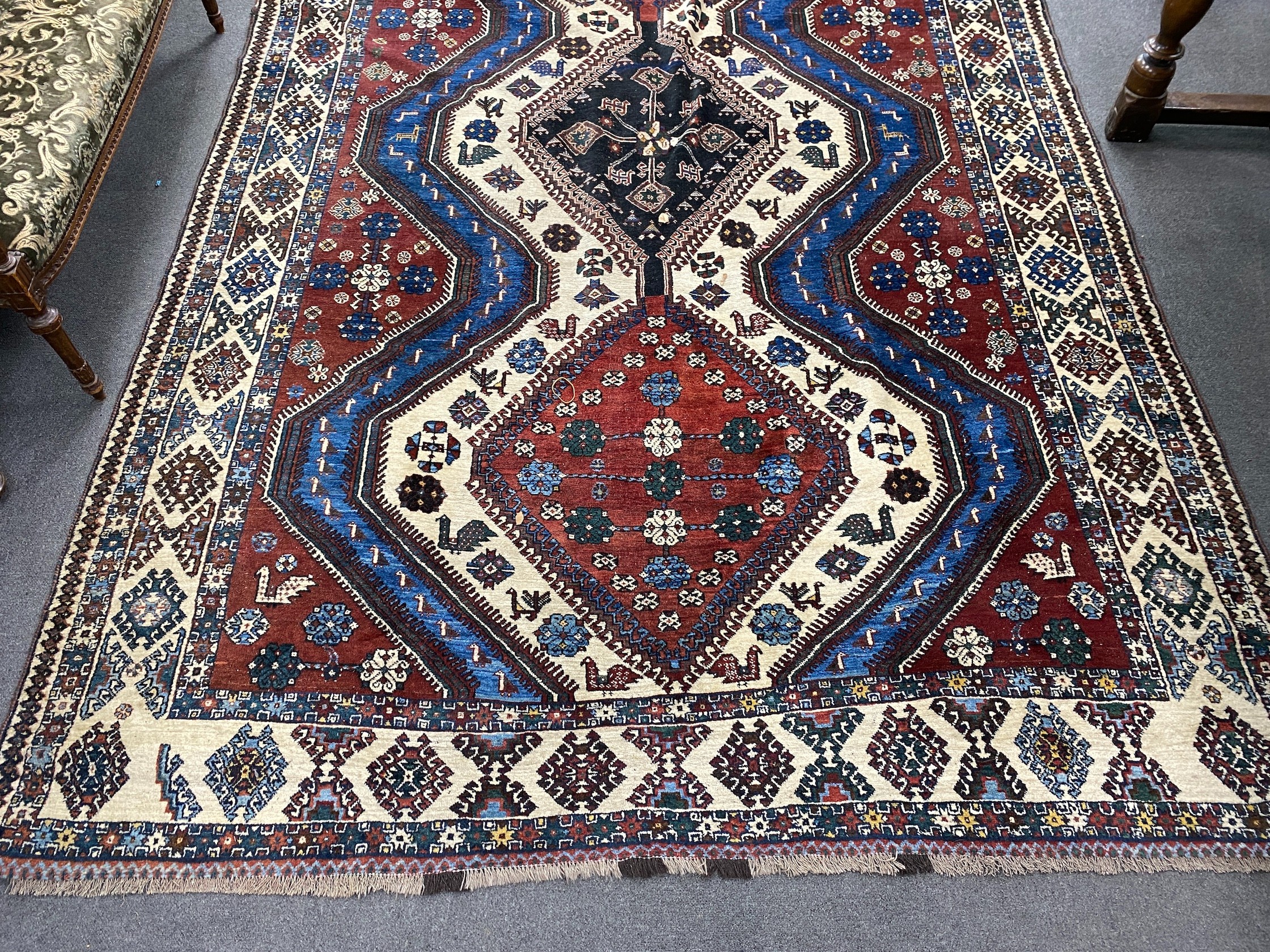 A Caucasian red ground carpet, 335 x 214cm - Image 2 of 4