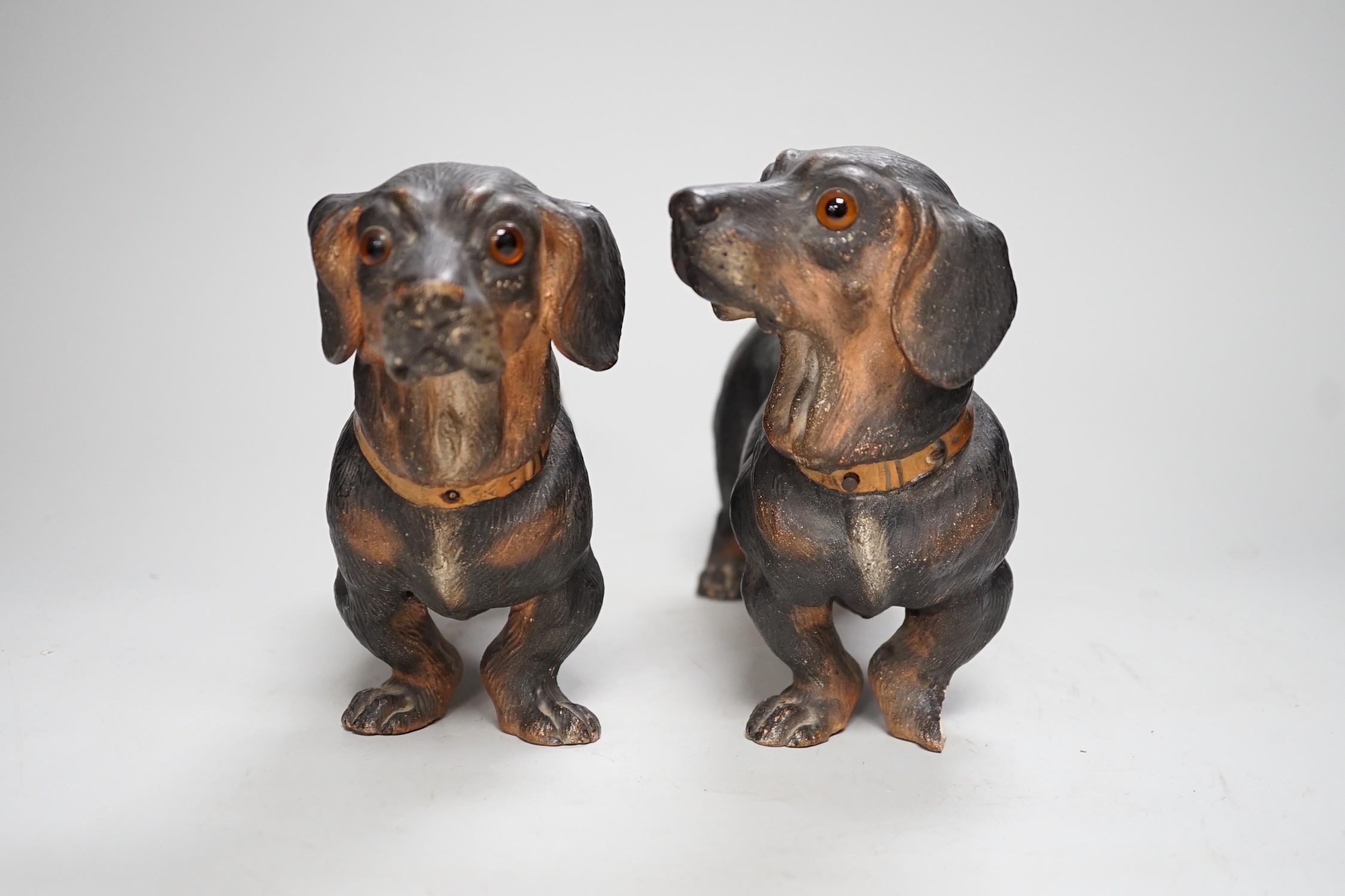 A pair of Austrian cold painted terracotta models of Dachshunds, one paw damaged, inset glass eyes - Image 3 of 5