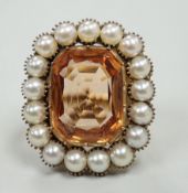A mid 20th century gold, orange topaz and split pearl set cluster ring (adapted from an earlier
