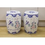 A pair of Chinese porcelain decorative garden seats, 37cms high