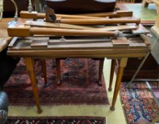 A pair of Edwardian mahogany campaign card tables, one requiring restoration, width 92cm, depth