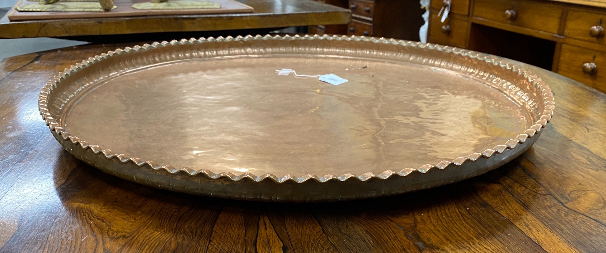 A large circular copper tray, diameter 74cm - Image 2 of 2