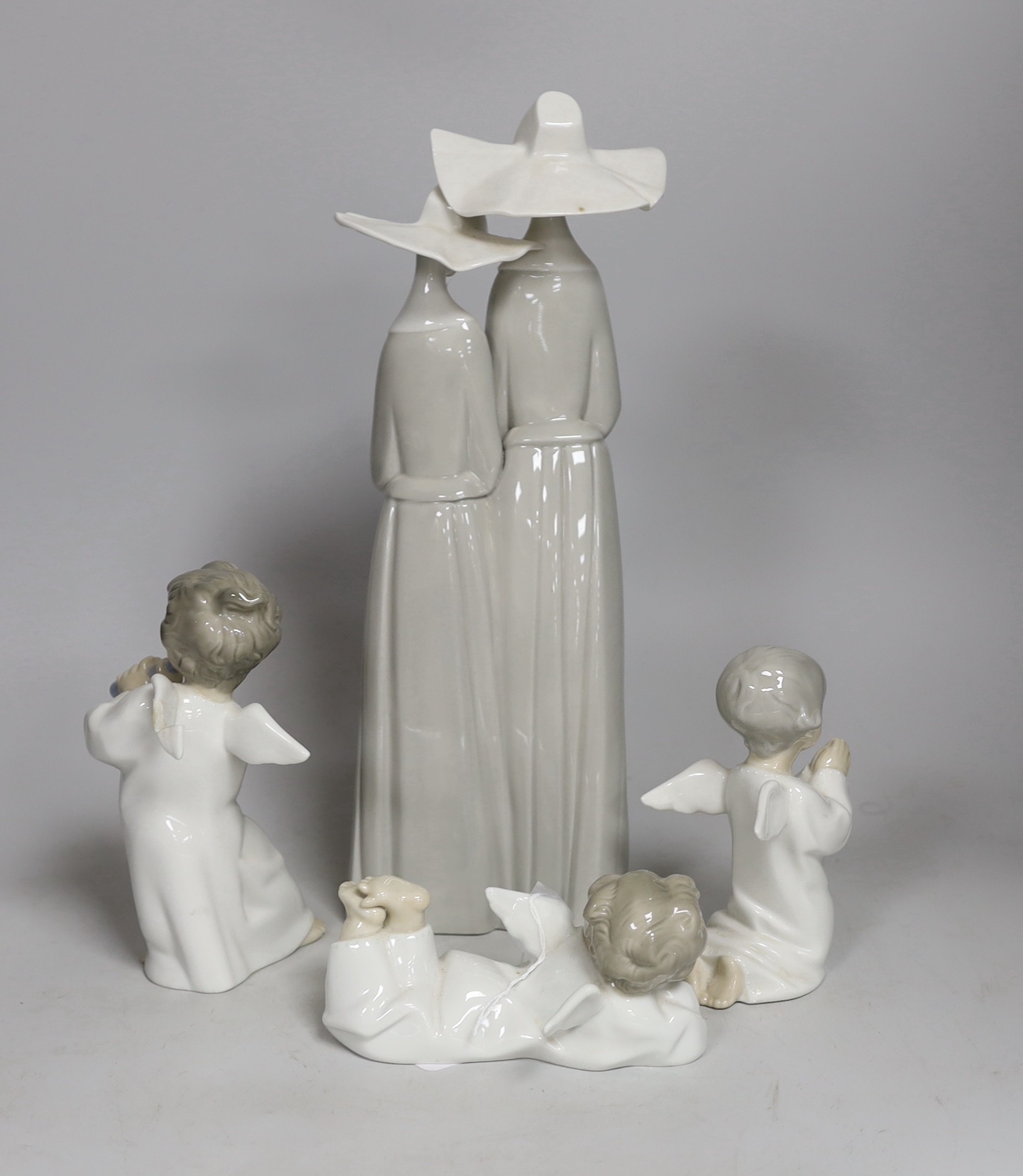 A selection of four assorted Lladro ceramic figures. Tallest 32.5cm - Image 2 of 2