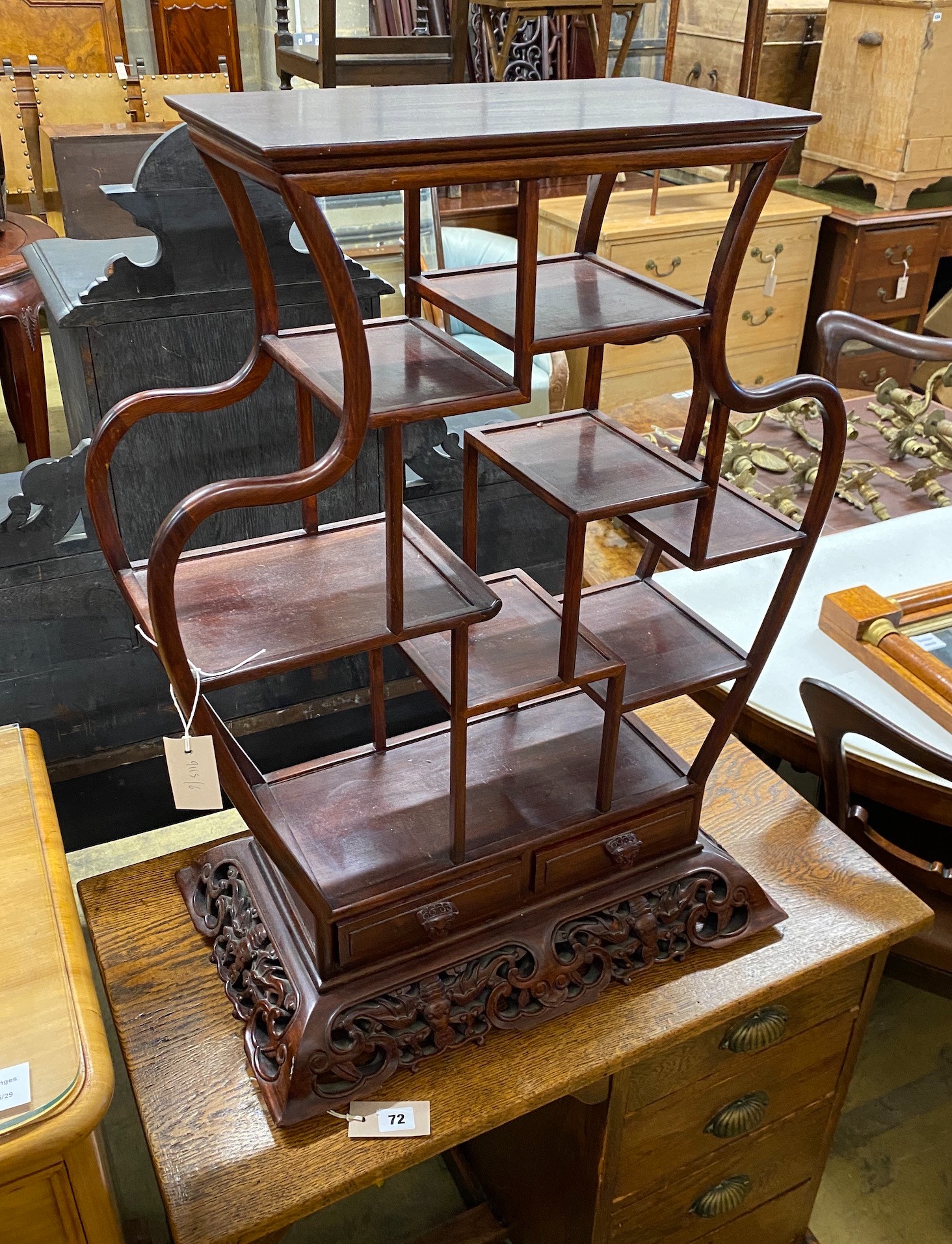A Chinese carved hardwood vase stand, width 60cm, depth 36cm, height 78cm
