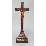 A carved wood Corpus Christi, 49cms high,