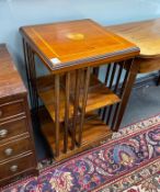 An Edwardian style inlaid mahogany revolving bookcase, width 47cm, height 79cm