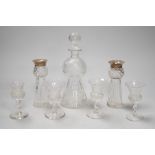 A late Victorian engraved thistle shaped liqueur decanter, 4 glasses and a pair of silver mounted