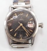 A gentleman's late 1950's? stainless steel Tudor Oysterdate manual wind wrist watch with black