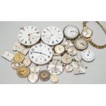 A collection of assorted wrist and pocket watch parts.