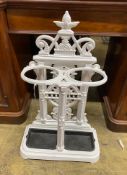A Victorian painted cast iron two division stick stand, width 56cm, depth 25cm, height 89cm