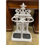 A Victorian painted cast iron two division stick stand, width 56cm, depth 25cm, height 89cm