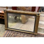 A Regency giltwood and composition overmantel mirror, width 95cm, height 64cm