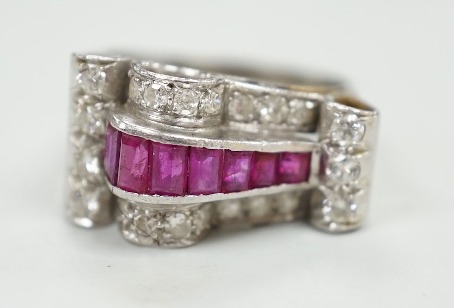 A 1950's? white metal, graduated ruby and diamond cluster set cocktail ring, size Q, gross weight