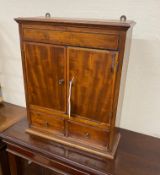 A George III style banded mahogany wall hanging medicine chest, width 39cm, depth 15cm, height 48cm