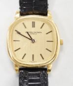 A lady's 18ct gold Vacheron & Constantin, manual wind wrist watch, on a leather strap with 750