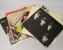 A collection of five Beatles LP’s to include top opening White Album