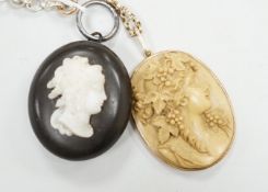A late Victorian yellow metal mounted oval lava pendant, carved with the bust of a lady to sinister,