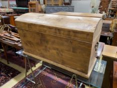 A 19th century continental pine domed top trunk, length 118cm, depth 63cm, height 70cm