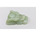 A Chinese bowenite jade dragon’s head belt buckle. 7cm wide