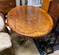 A Victorian oval figured walnut tilt top loo table, length 146cm, width 110cm, height 72cm