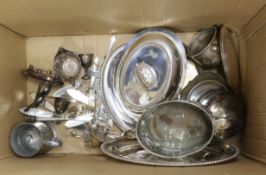 A small collection of plated wares, including an oval tray, an entree dish and cover, cutlery etc.
