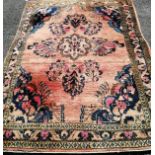 A North West Persian red ground rug, 210 x 150cm