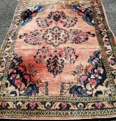 A North West Persian red ground rug, 210 x 150cm