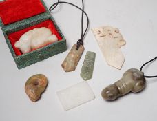 A group of various Chinese jade carvings and a white glass plaque