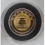 A Chinese Panda gold and silver 10 Yuan coin