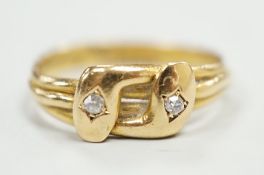 A late Victorian 18ct gold and two stone diamond set twin serpent ring, size L, gross weight 2.6